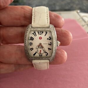 Michele Mini Urban watch with diamond bezel and white leather band.
